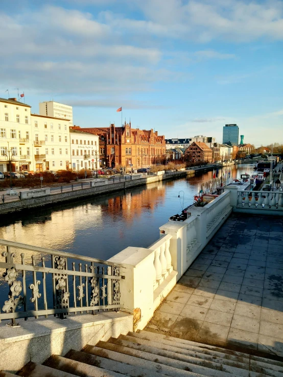 some water buildings and steps with a railing