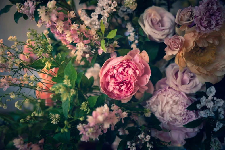 a vase of flowers sitting on a table