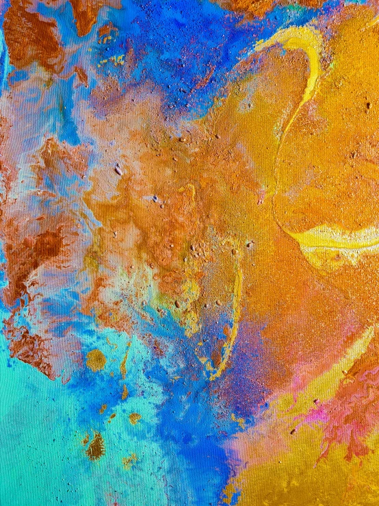 an abstract background of colorful paint splatkled on the canvas