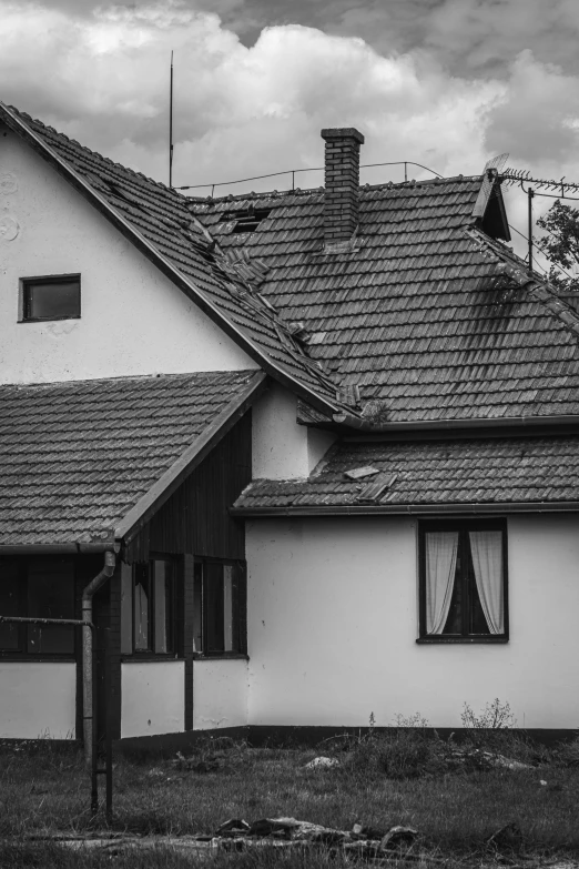 the black and white pograph shows two houses