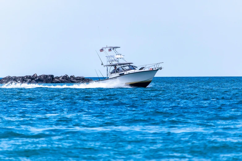 a fishing boat that is out on the water