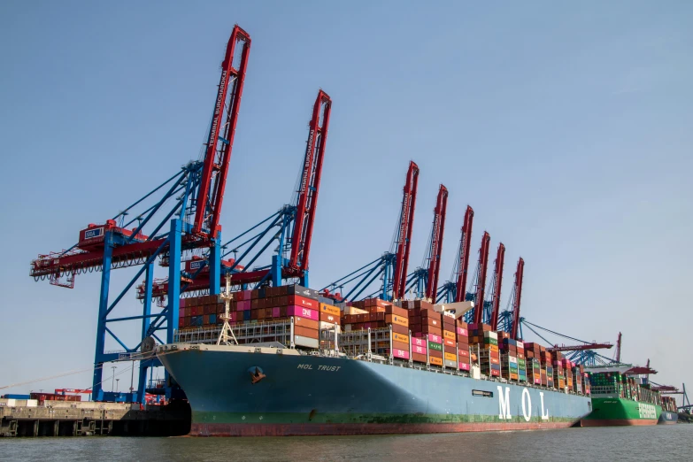 large cargo ship in the ocean under the blue sky