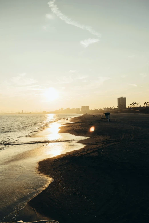 an ocean with lots of water and a person in the distance