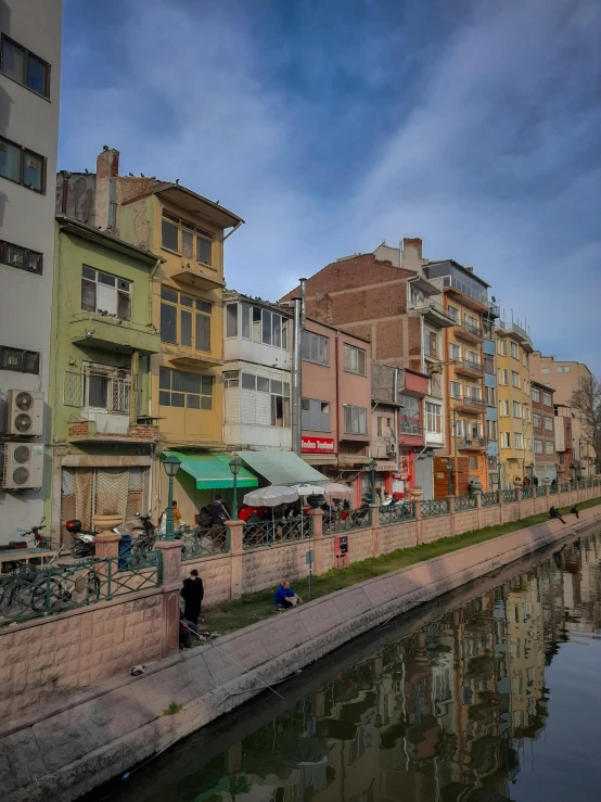 buildings along the canal of a river in europe