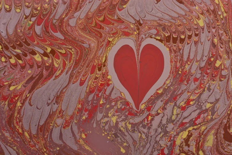 a painting with red and brown paint has a heart shaped cut out