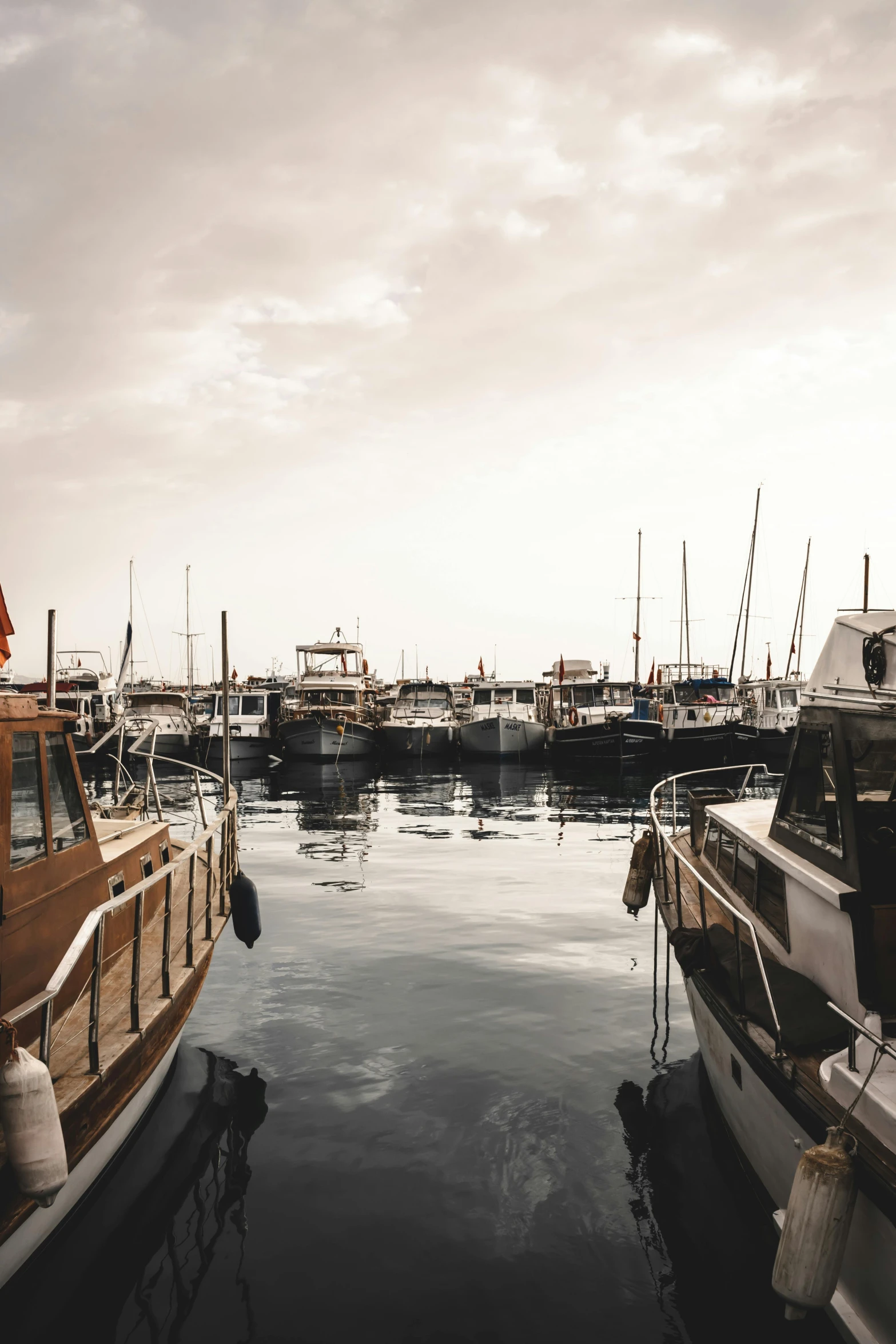 boats are docked in a large body of water