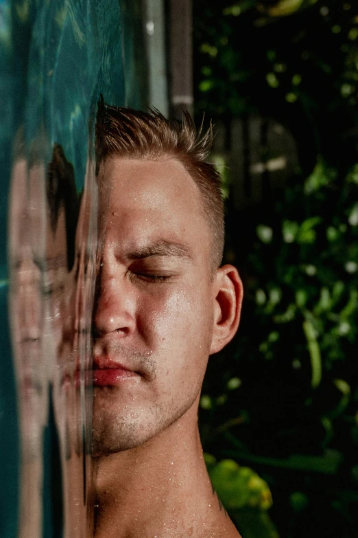 a close up of a person behind a mirror