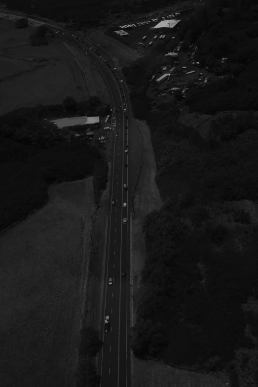 traffic traveling down the highway in a rural setting