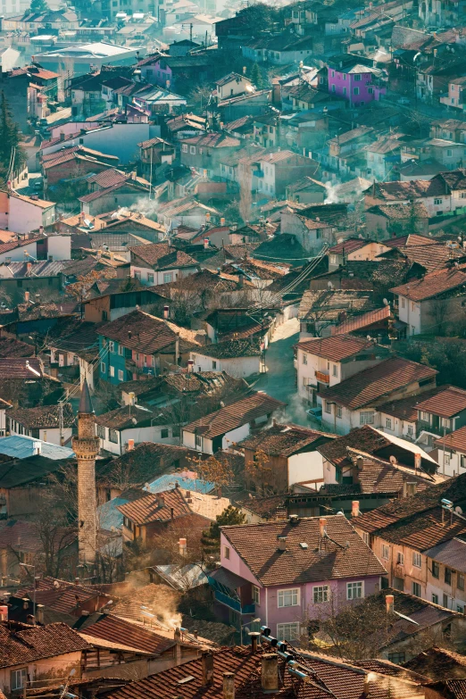 the view of a very large city that has a lot of old houses