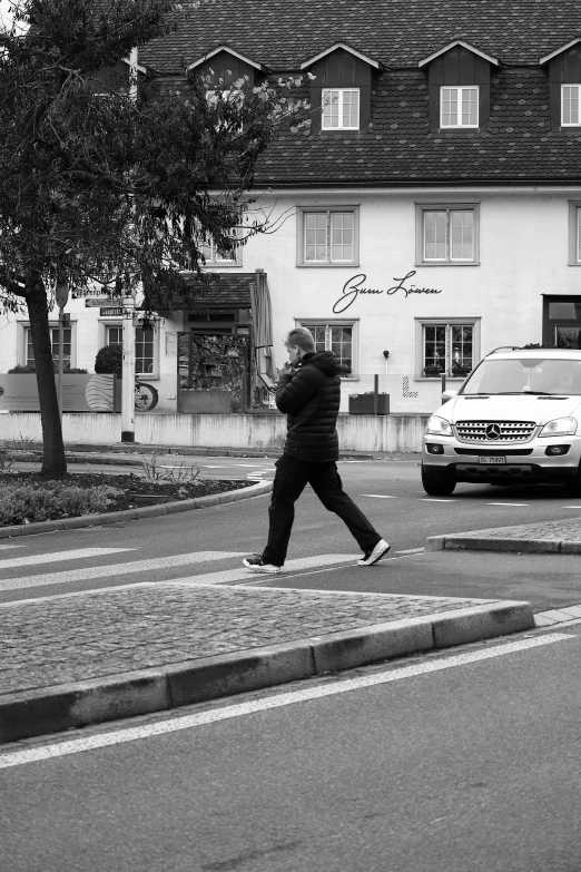 man walking with his foot on the ground