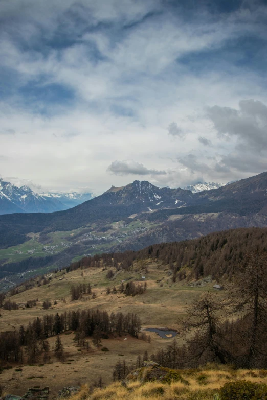 a mountain range that has some snow on top