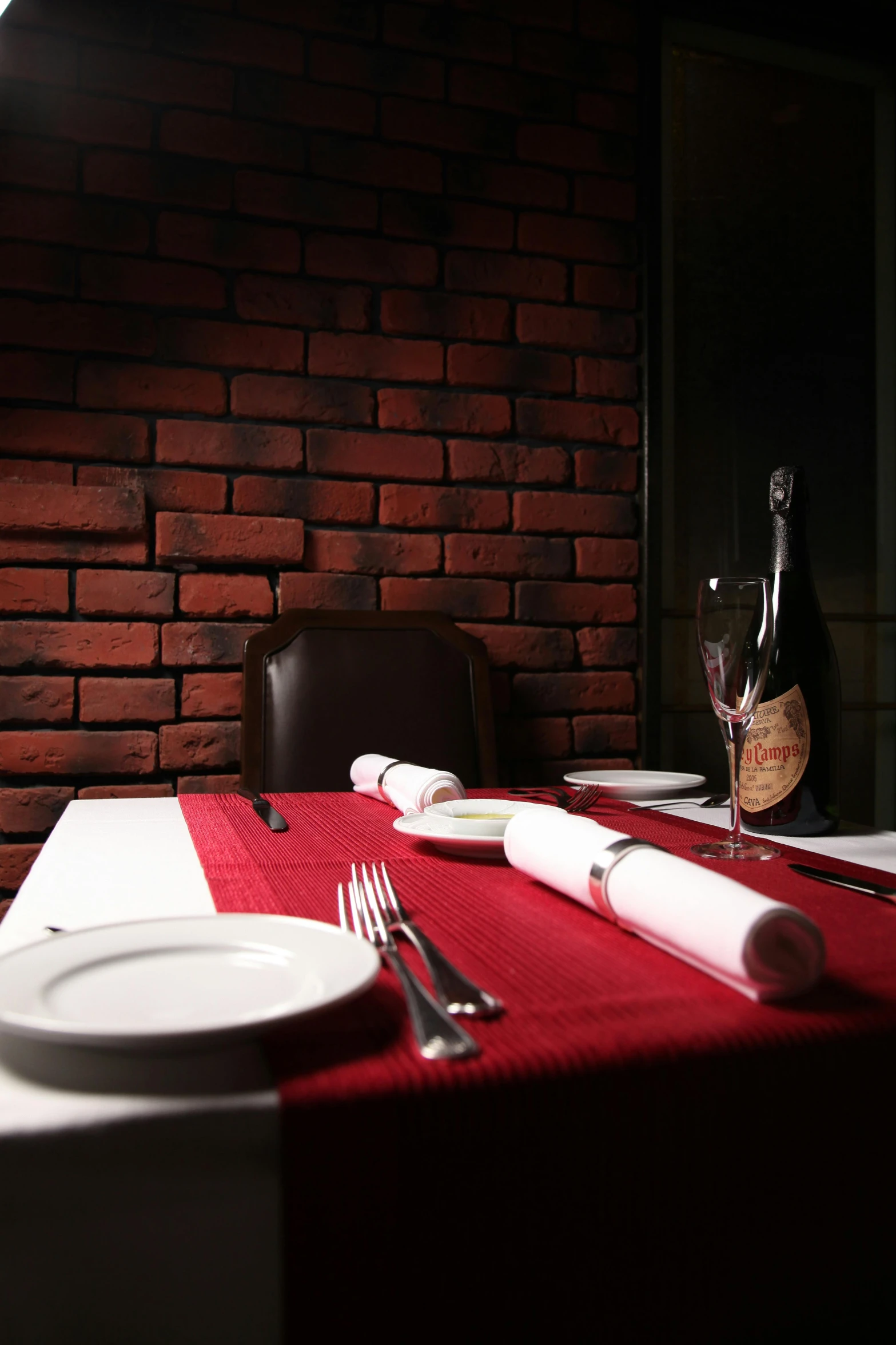 a table with place settings set up for dinner