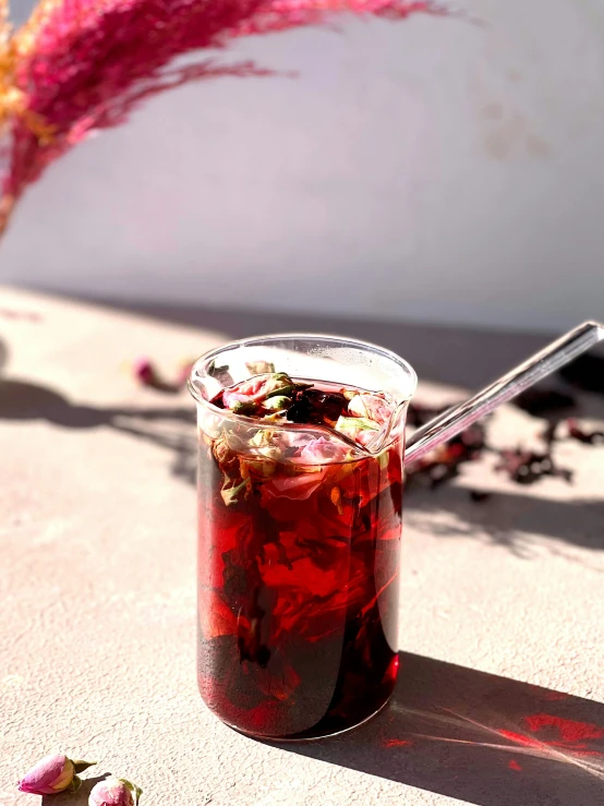 a large glass full of some kind of liquid