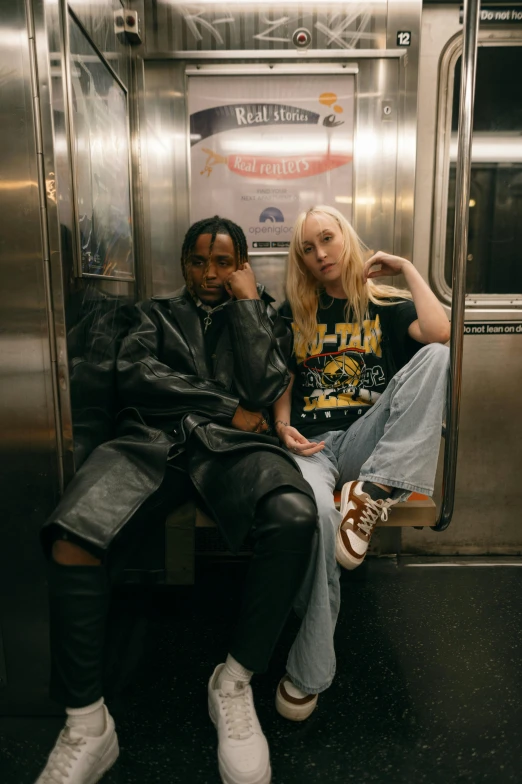 two people on a subway subway train