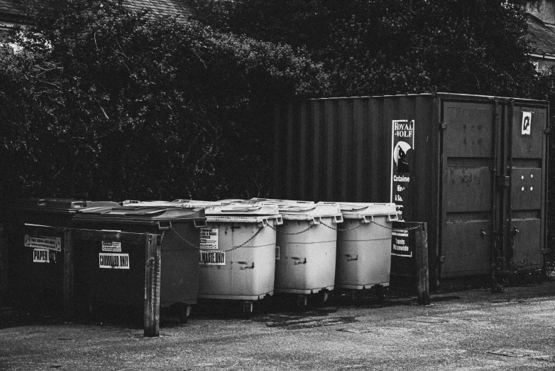 black and white po of various containers and trees