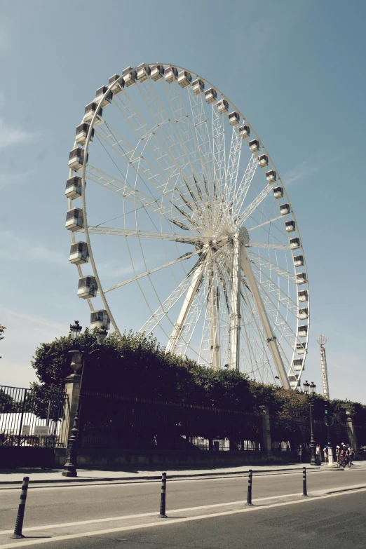 an amut wheel is near the curb on a sunny day