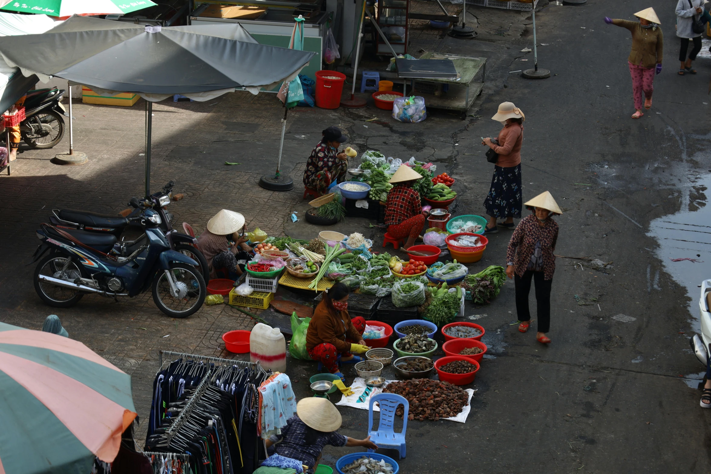 an asian market with several stalls of fresh food