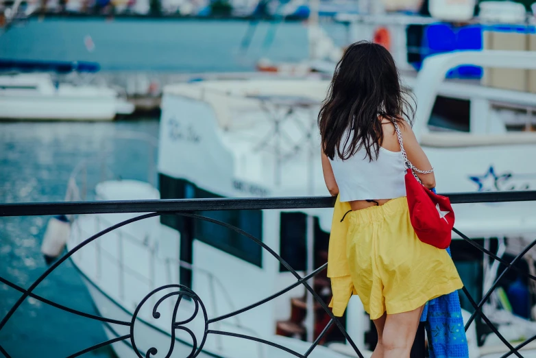 a woman walking up to the dock