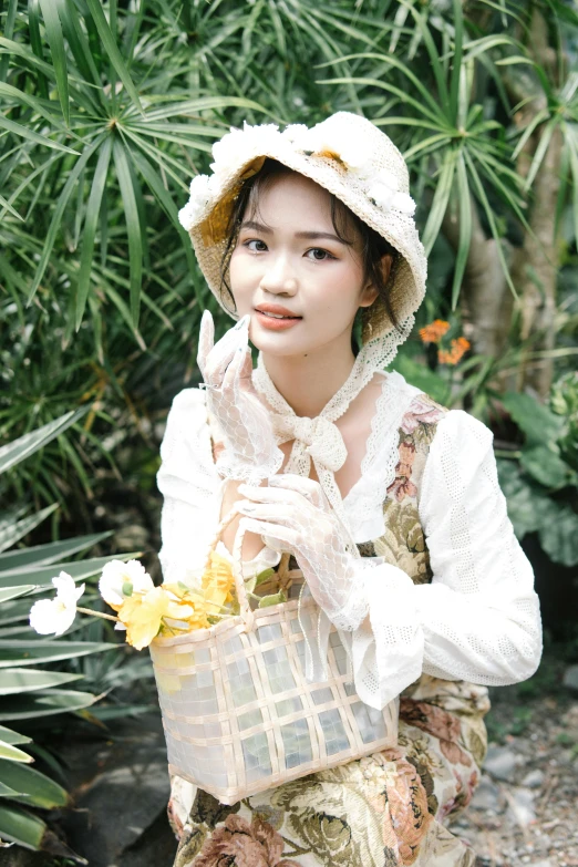 a girl dressed up in an antique style outfit