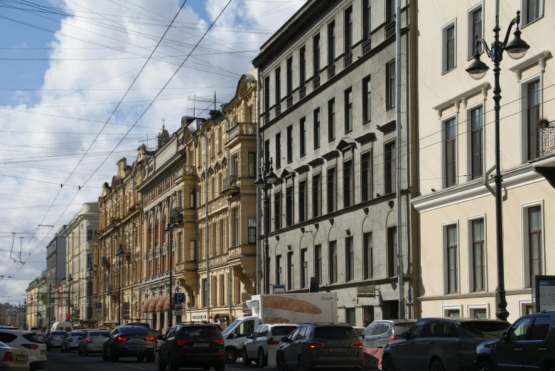 the traffic of several cars are on the city street