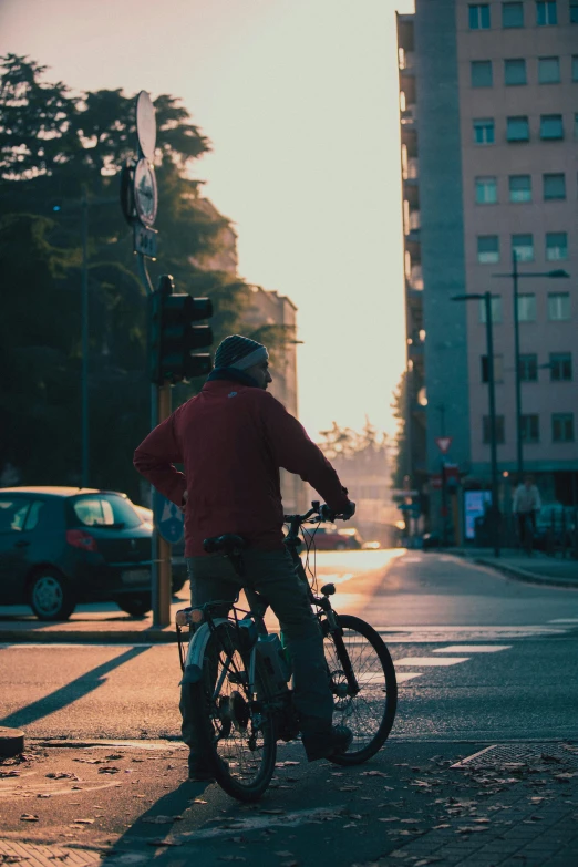 a person on a bike next to the street