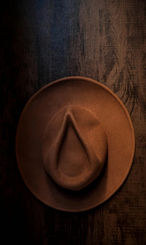 an empty hat is resting on the table