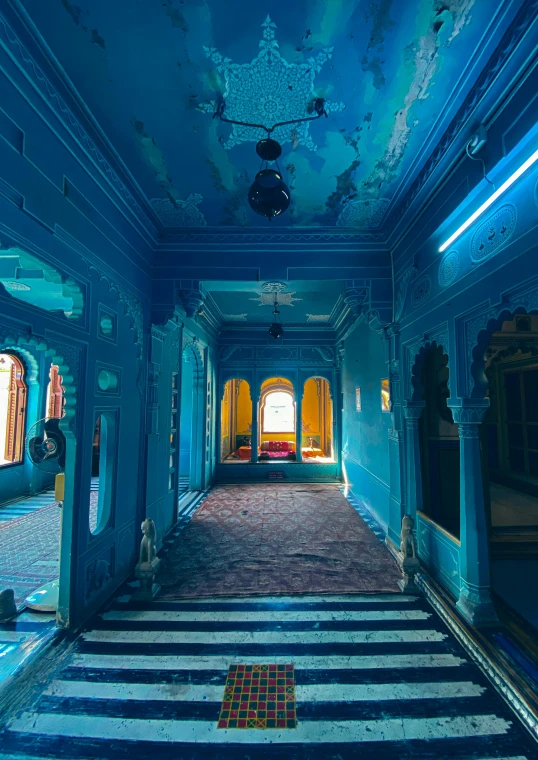 an old building with many mirrors and ceiling