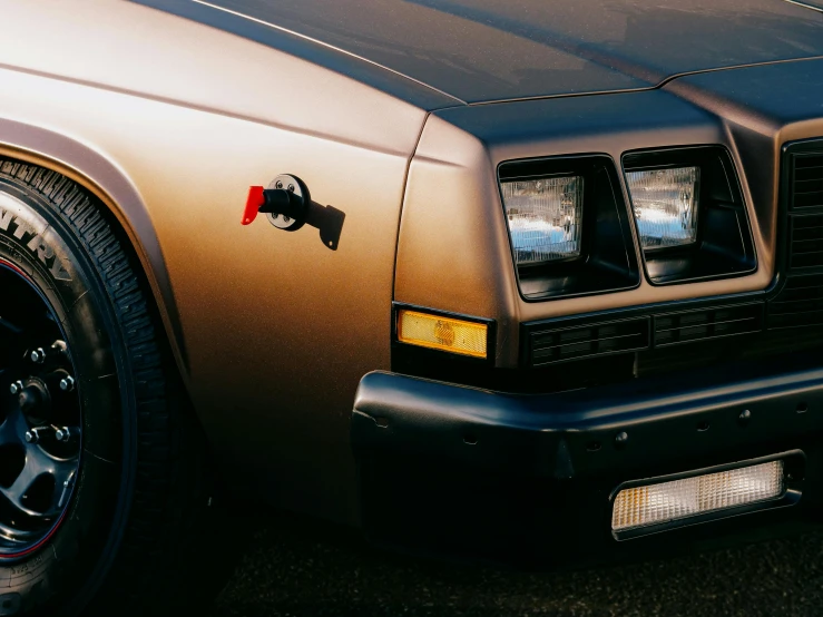 the front end of a car with a mustang emblem on it