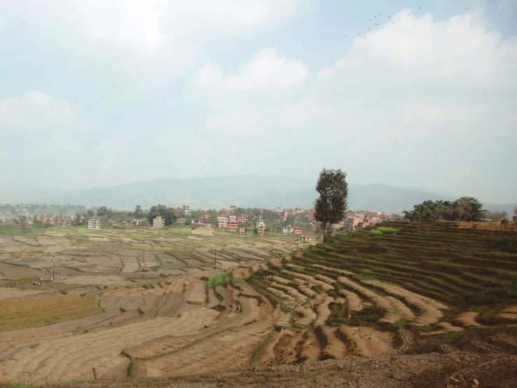 the village is next to the big, muddy hill