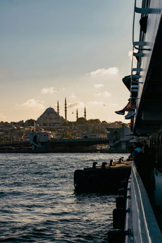 a view from the dock to a city in the distance