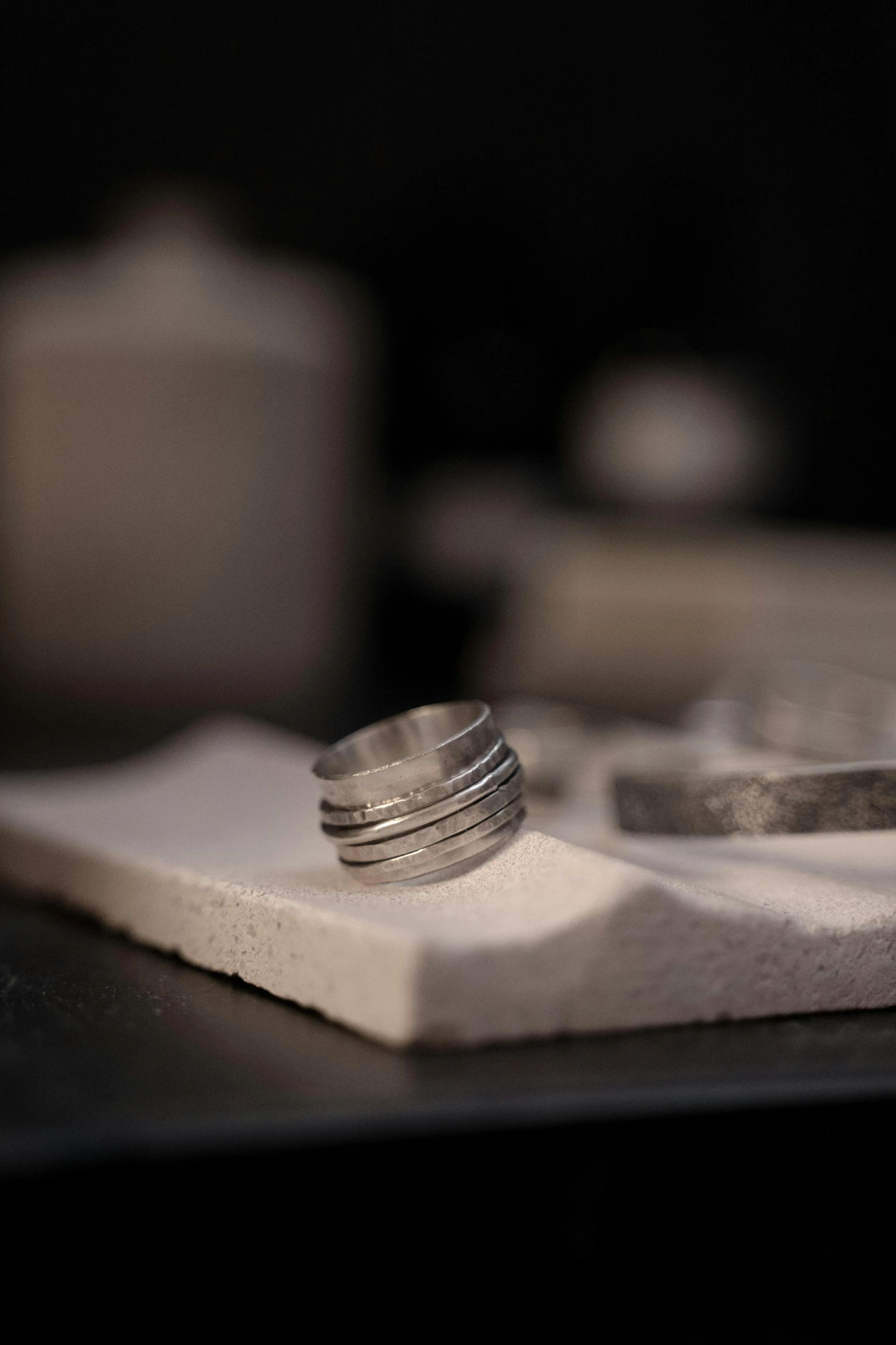 stacking rings on top of a plate on the counter