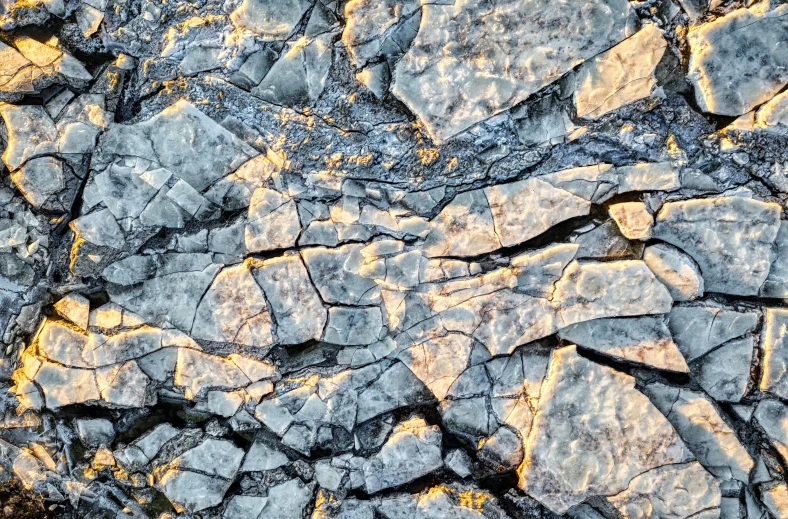 a rocky landscape of rock type with a yellow sun light