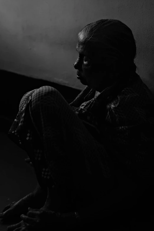 a black and white po of an older woman