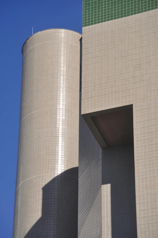 a tall building with a clock on the outside