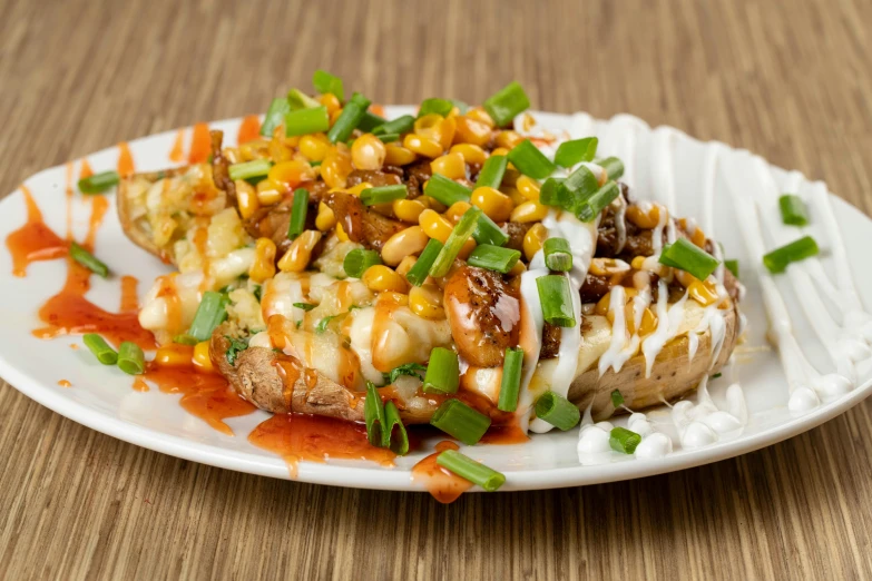 a white plate with some sliced up food