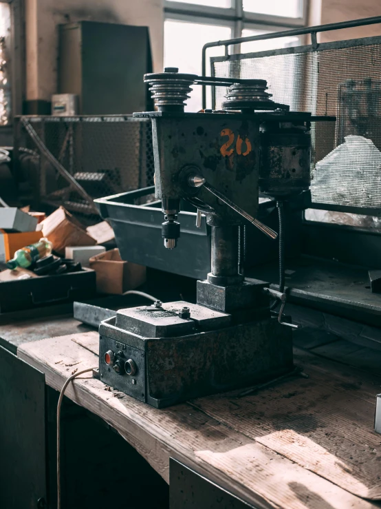 an old machine in a factory near a window