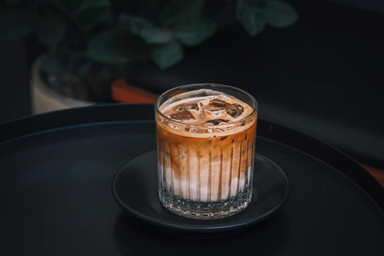 a glass that is sitting on a table