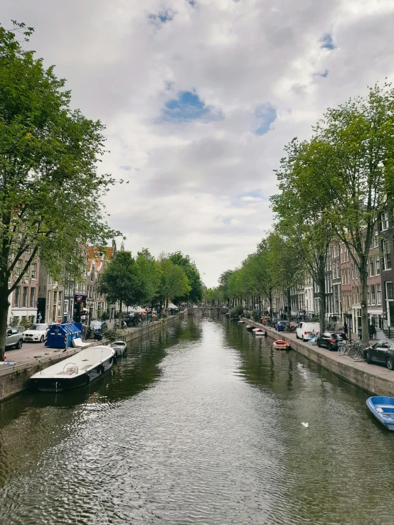 boats in the canal of an older city