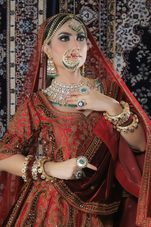 woman dressed in a bridal dress standing with headpieces