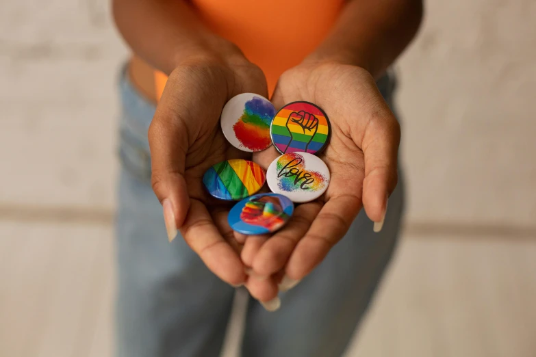 a child holding an egg with the word happy on it