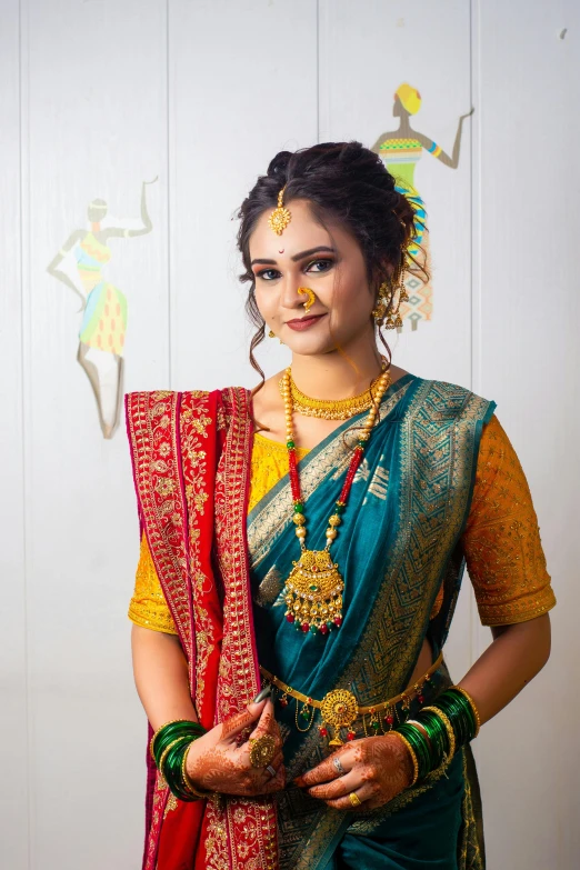 a woman with an elaborate head piece and jewelry