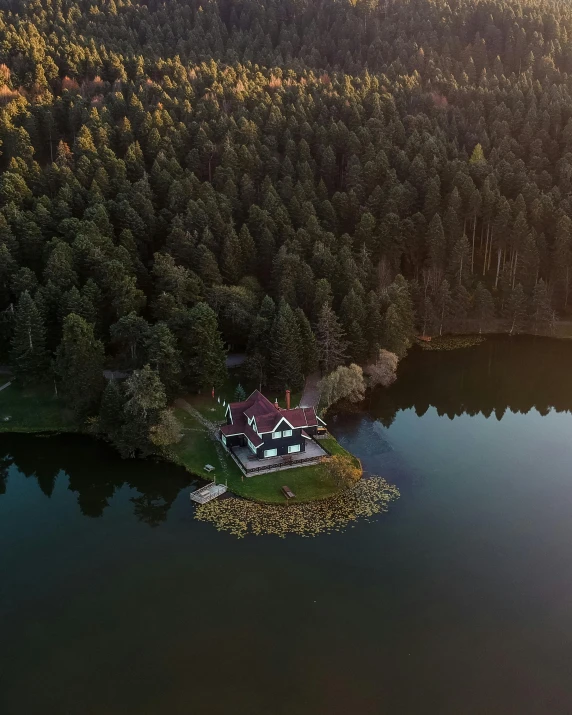 a large house in the middle of some water