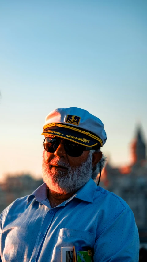 an older man with a mustache and sunglasses