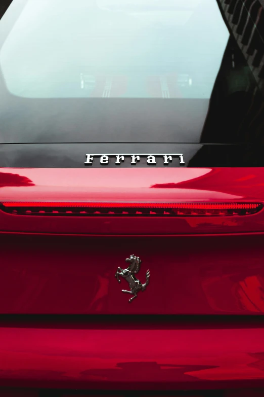 a ferrari logo is shown on a red vehicle