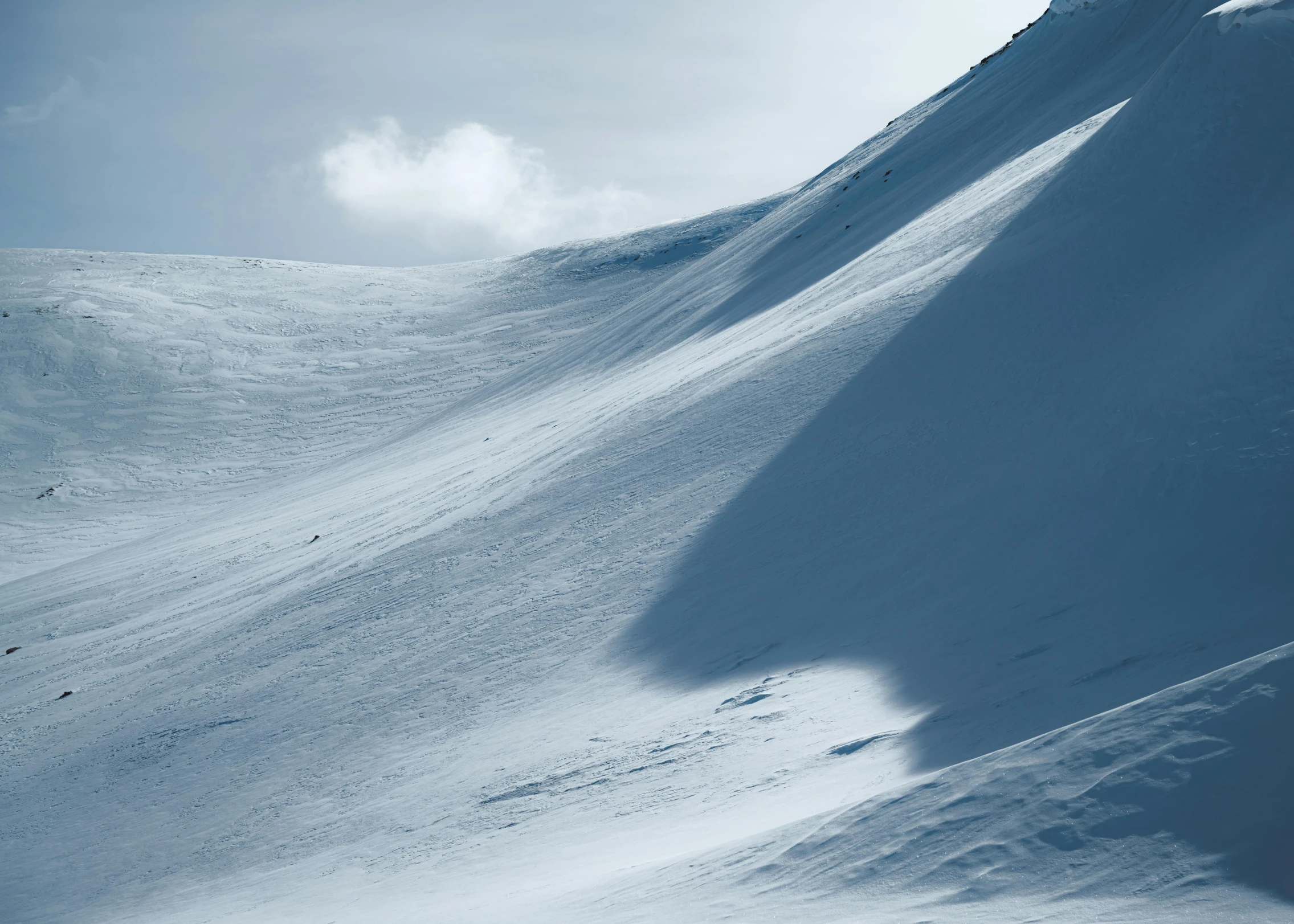 this mountain is covered with very white snow