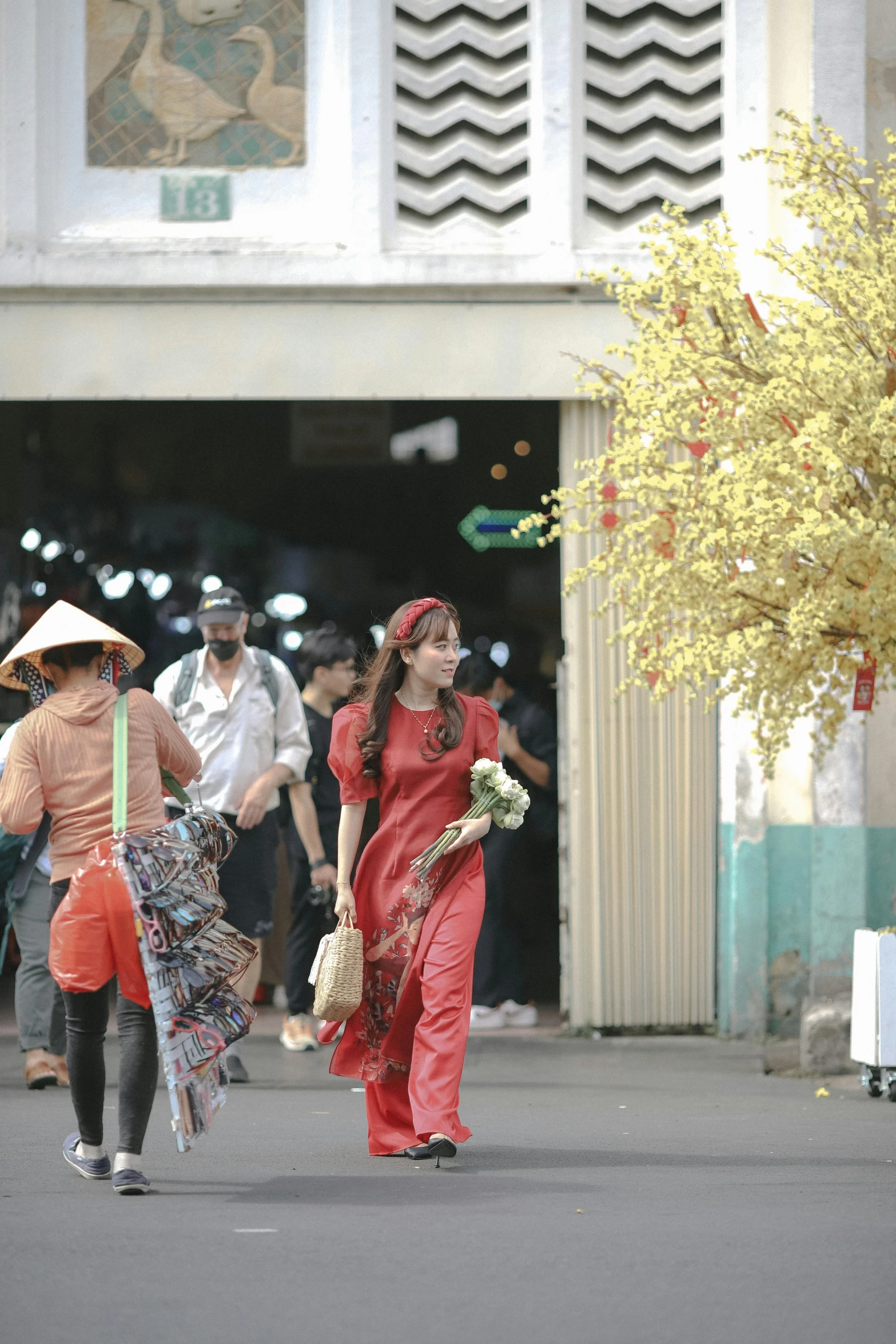 two ladies in colorful outfits walking on the street