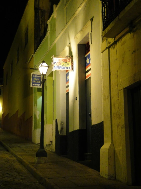 an empty street that has two lights on it