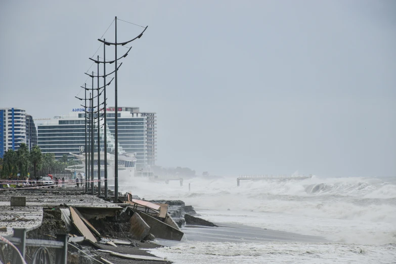 a tall wooden pole with lots of water on it