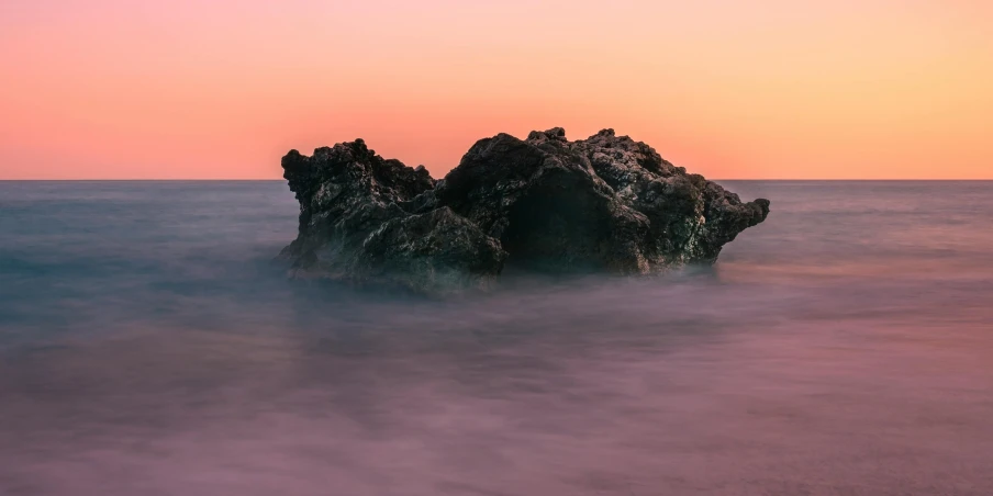 the rocks have been washed in on the beach