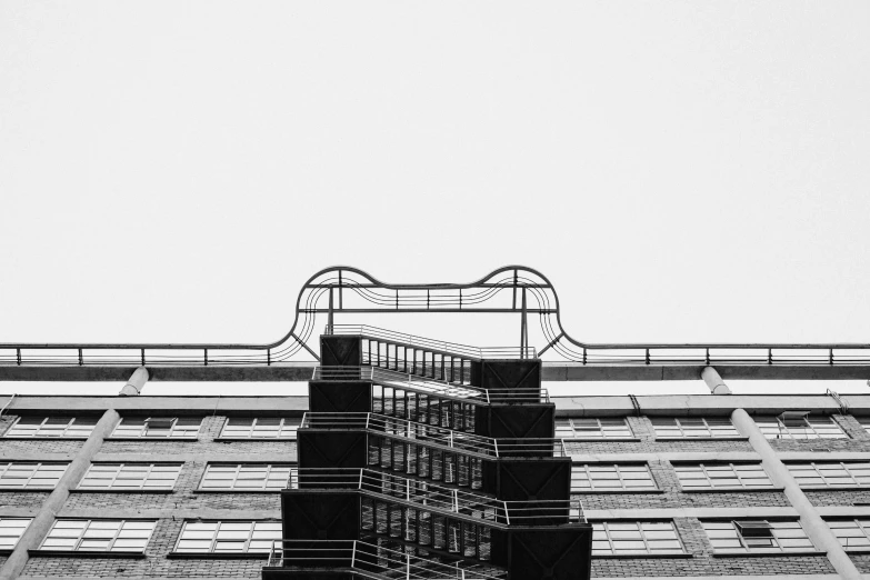 an abstract black and white po of some tall buildings